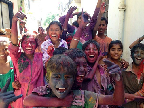Happy children with colour on their faces. Holi festival. Photo: Jana Schwarz.