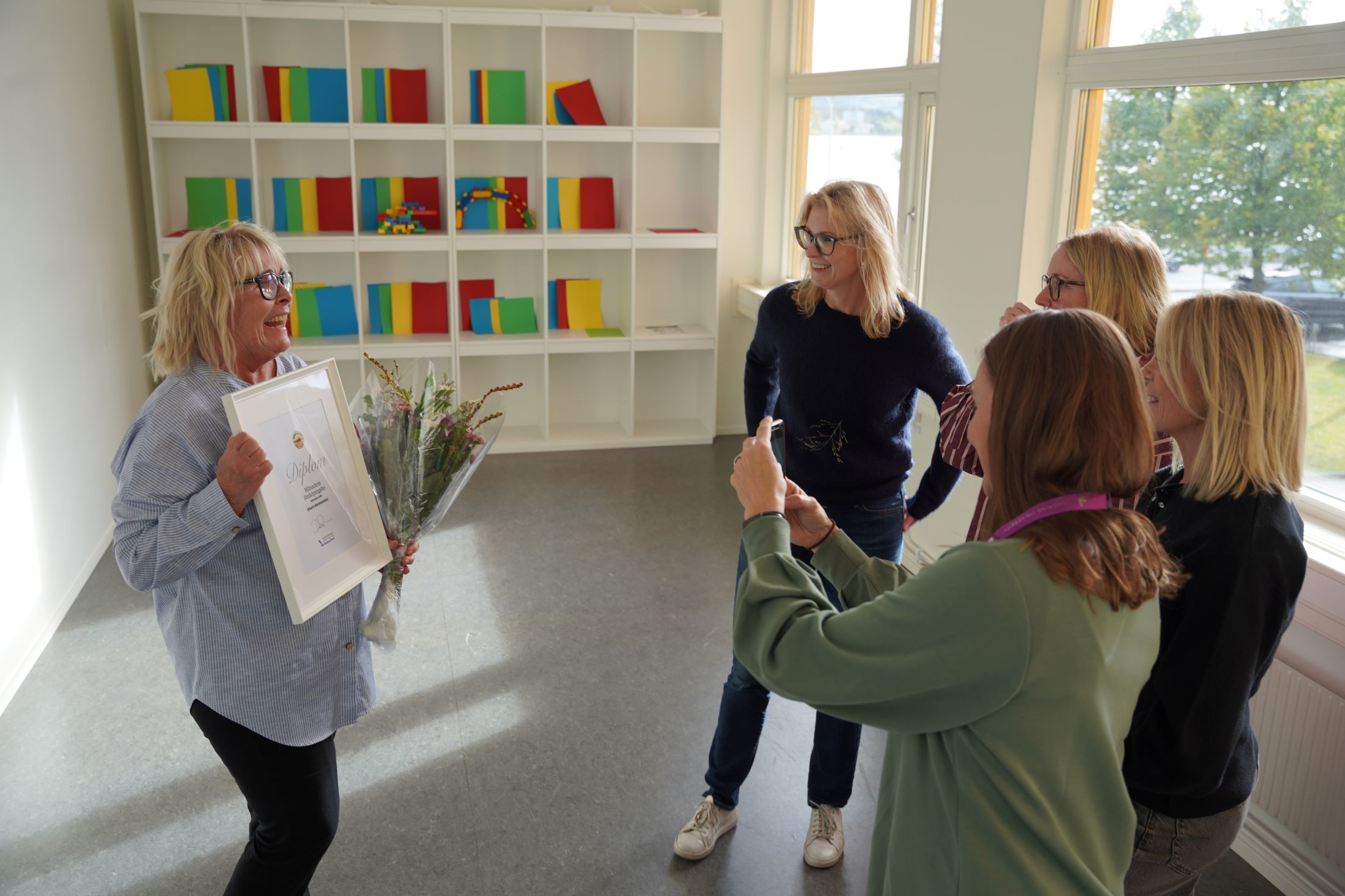 Happy women in a room.