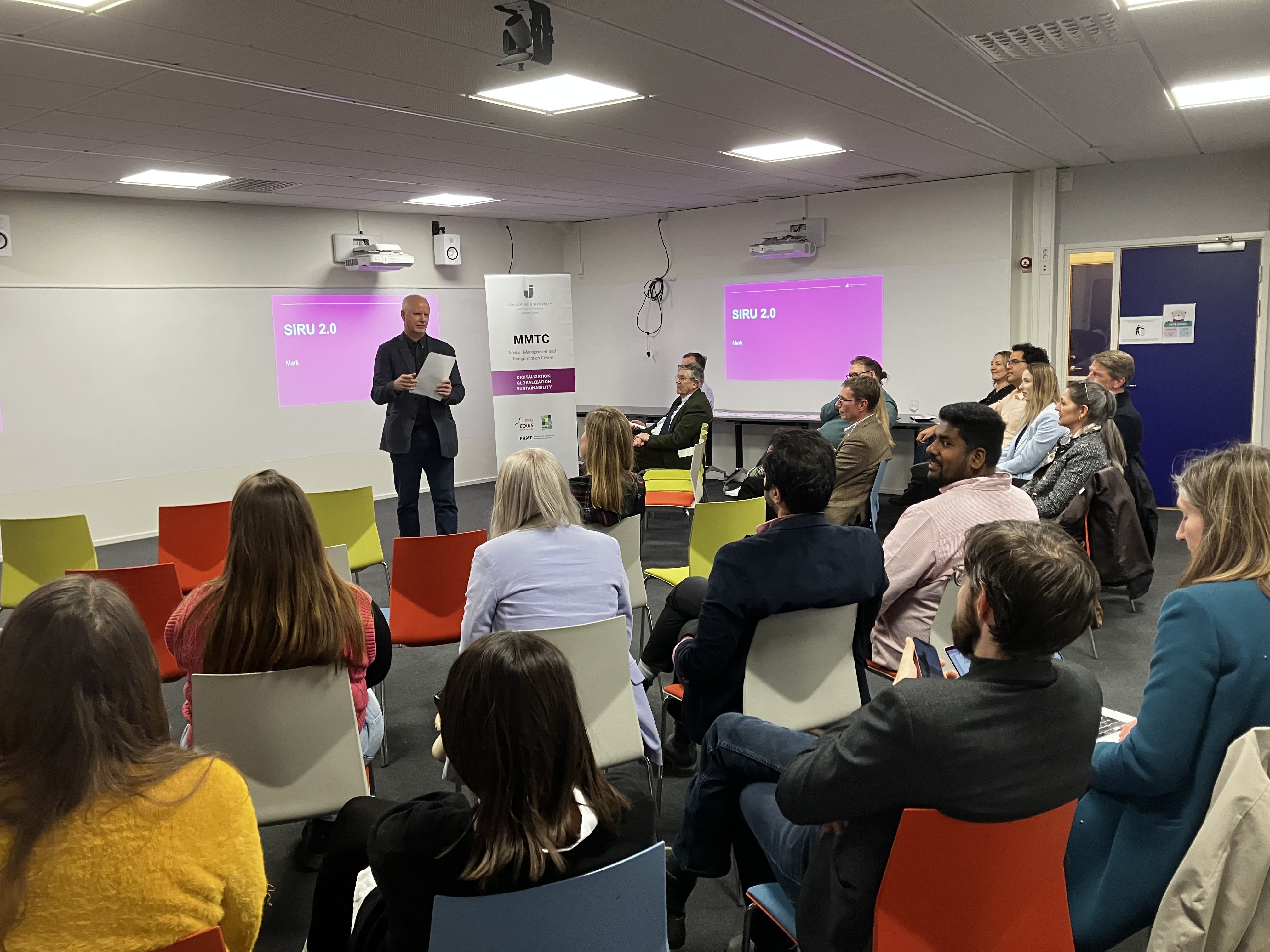 Man talking to group